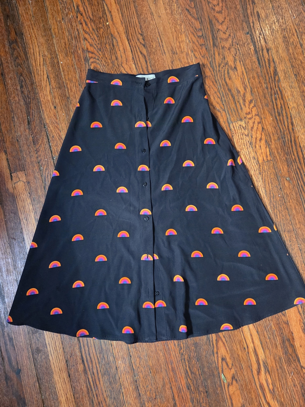 Black A-Line Button-Front Skirt with Soft Rainbow Semicircle Print
